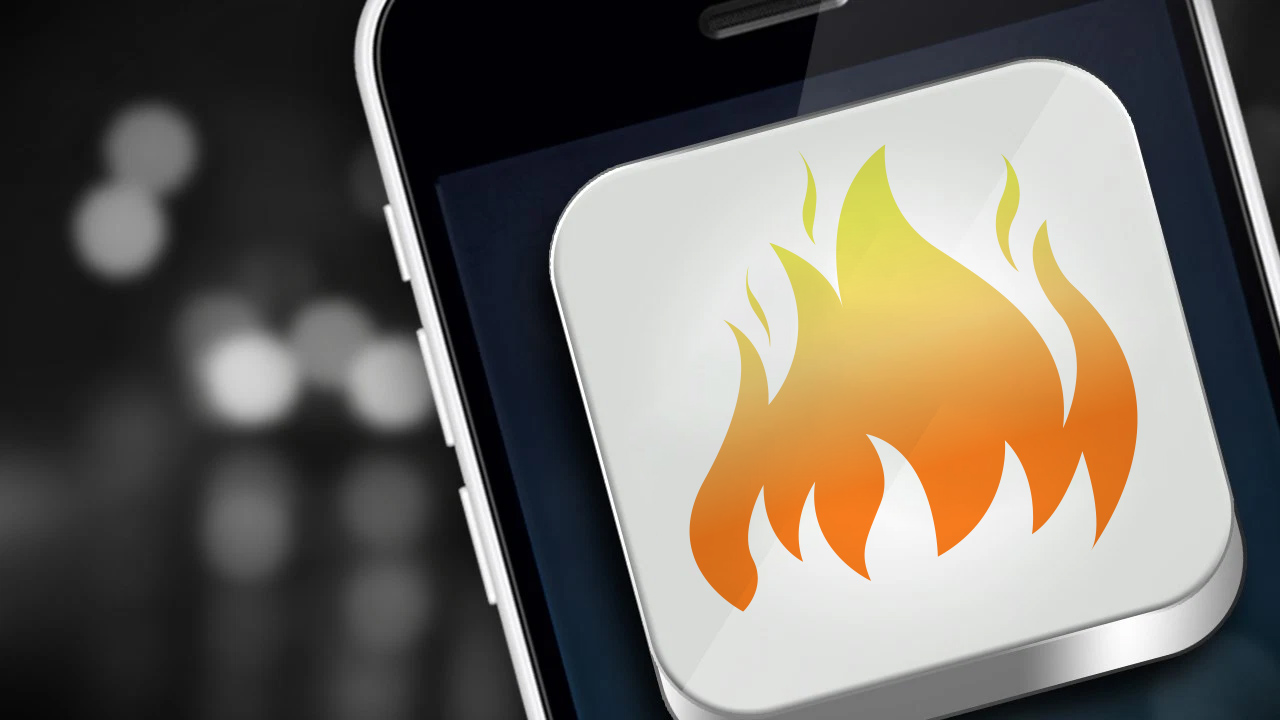 Tinder logo on mobile phone